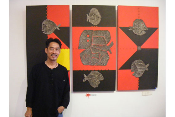 Họa sĩ Lâm Thanh và tác phẩm đoạt giải A, 2013, ảnh: H.Đ.N